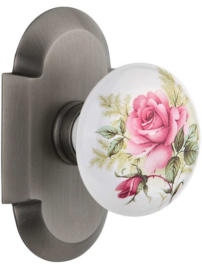 Arched Rosette Door Set with Rose Porcelain Knobs in Antique Pewter.